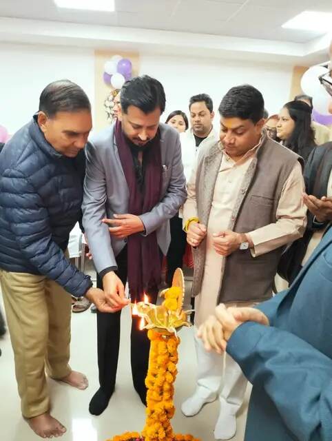 Tushar Kumar lighting the ceremonial lamp at the inauguration of a Karnataka Bank Limited branch